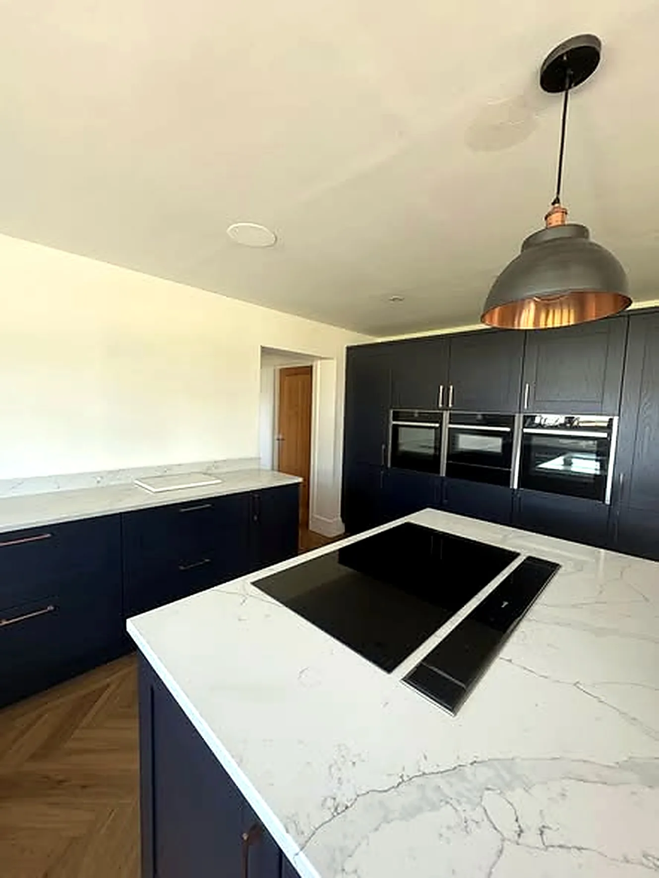 Clean black and marble kitchen island
